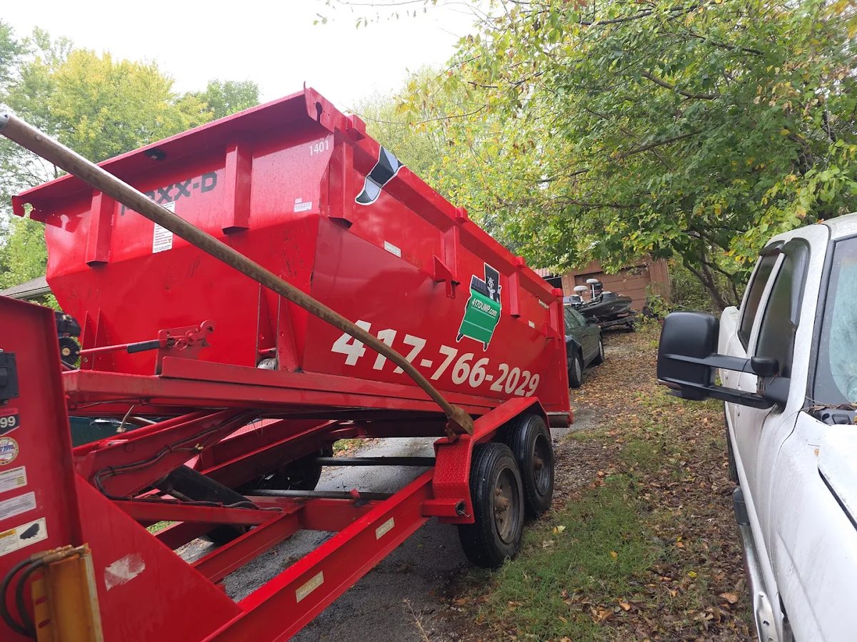 A 417 Dumpster Rental roll-off dumpster on a job in Mount Vernon, Lawrence County, MO.
